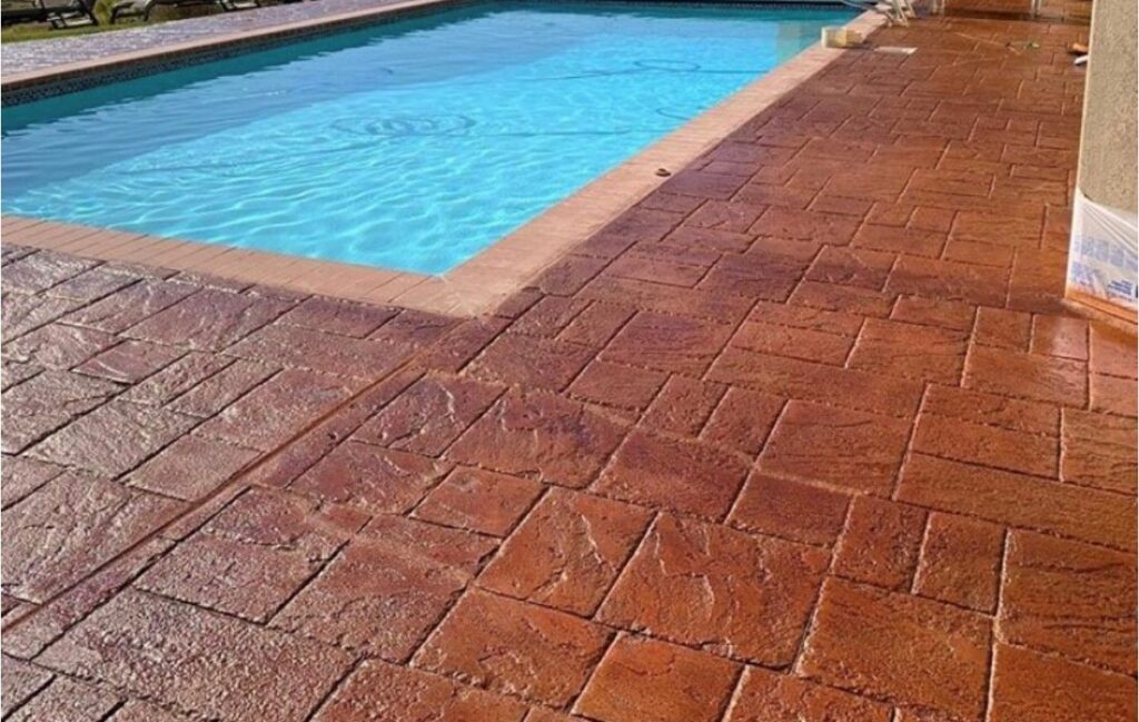 poolside concrete coated in acid-based concrete stain